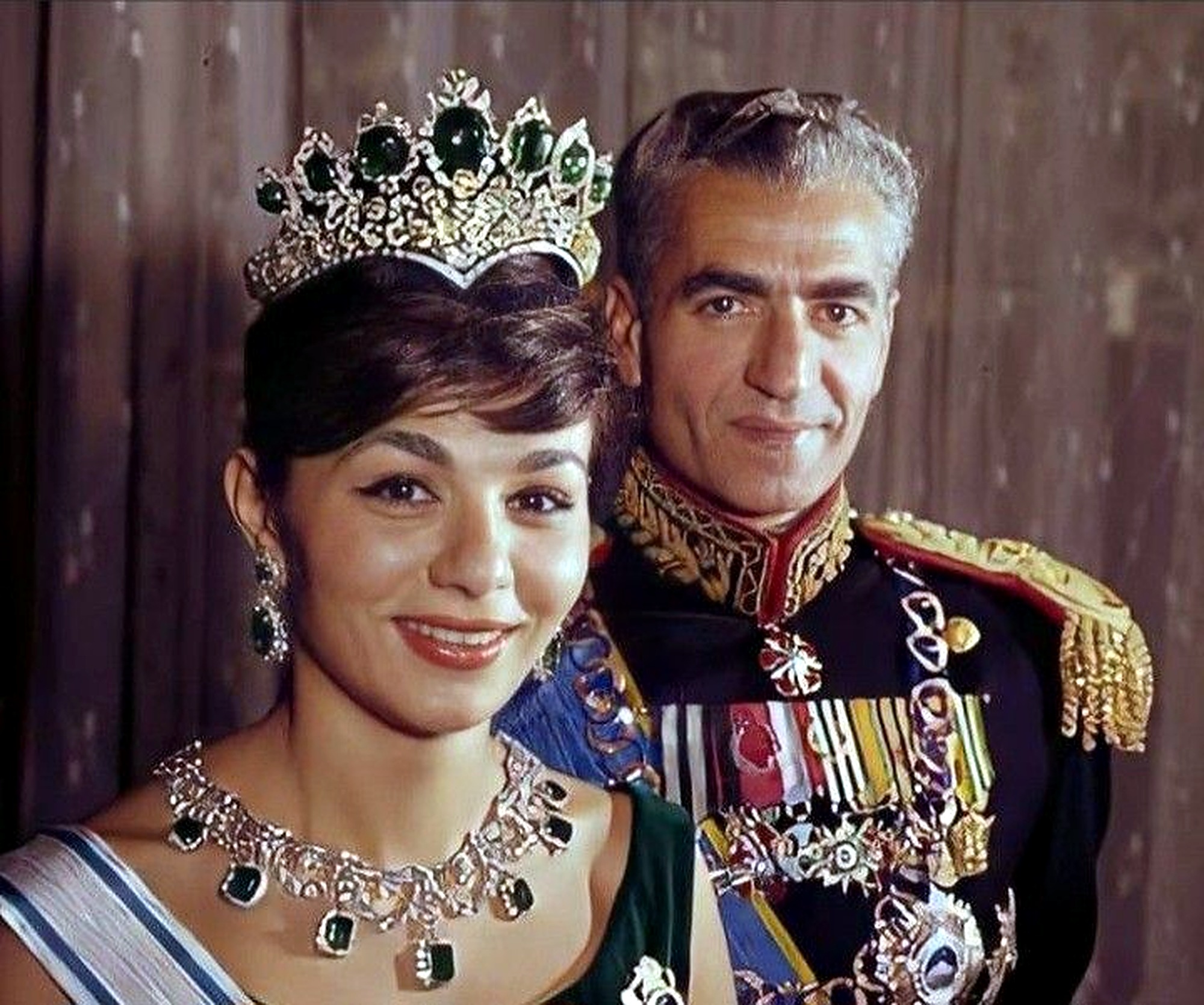 Farah Pahlavi in the emerald tiara with Mohammad Reza Shah.
