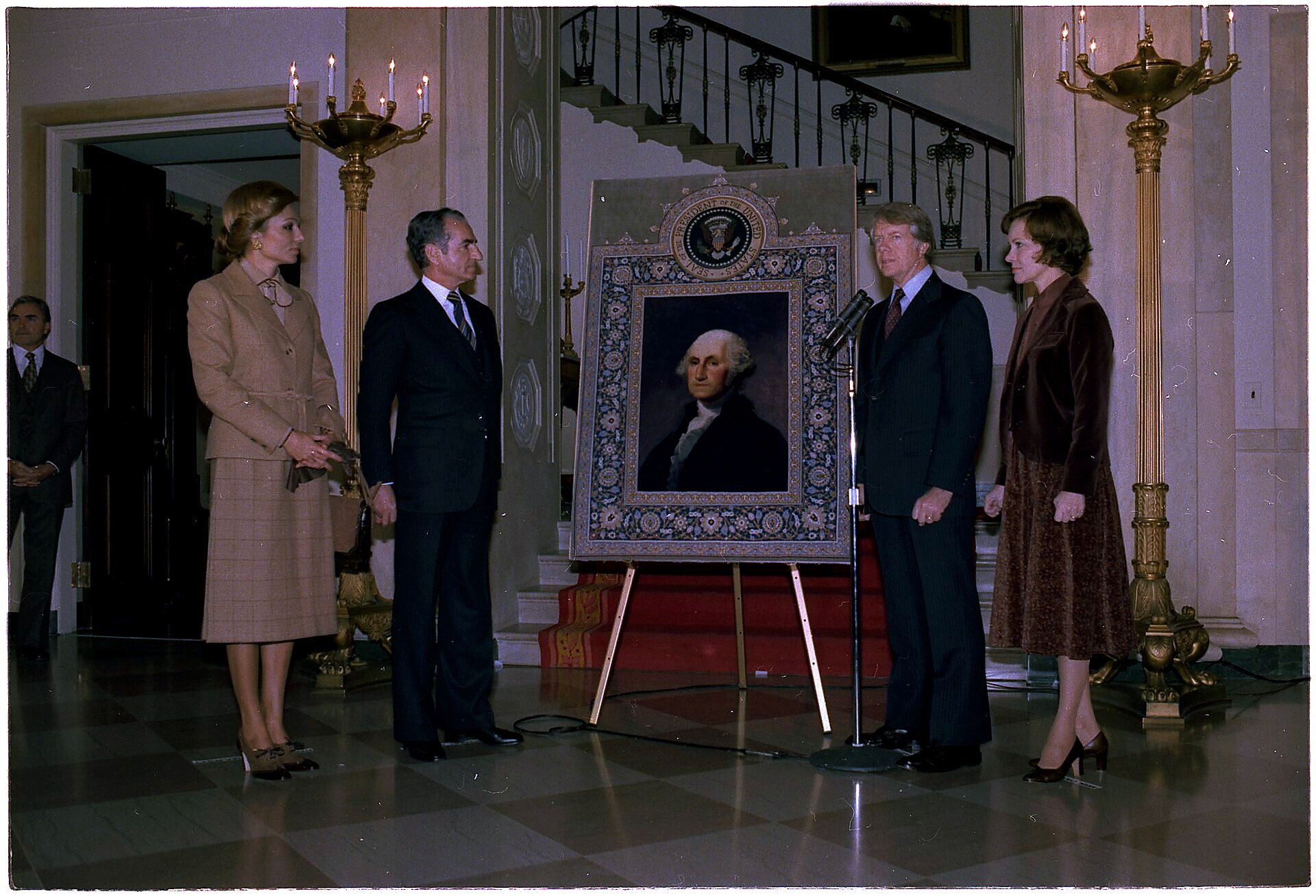The Shah Of Iran And Shahbanou Of Iran Present Jimmy Carter And Rosalynn Carter With A Tap.
