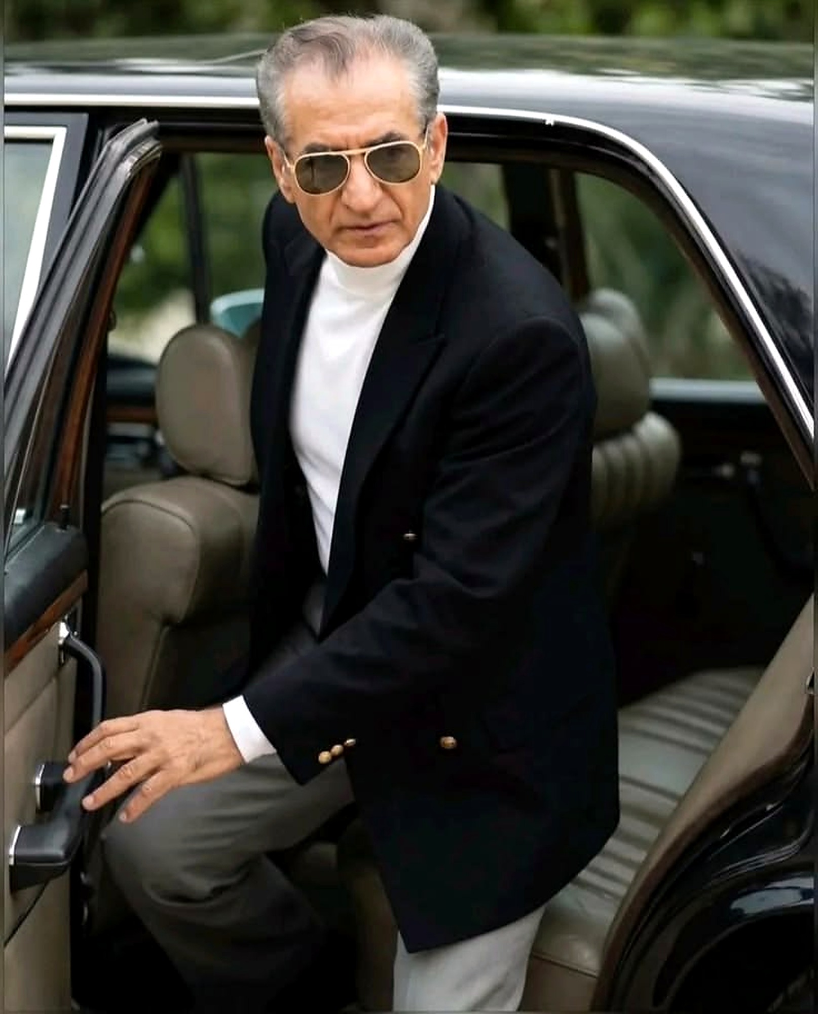 Stepping from the car.