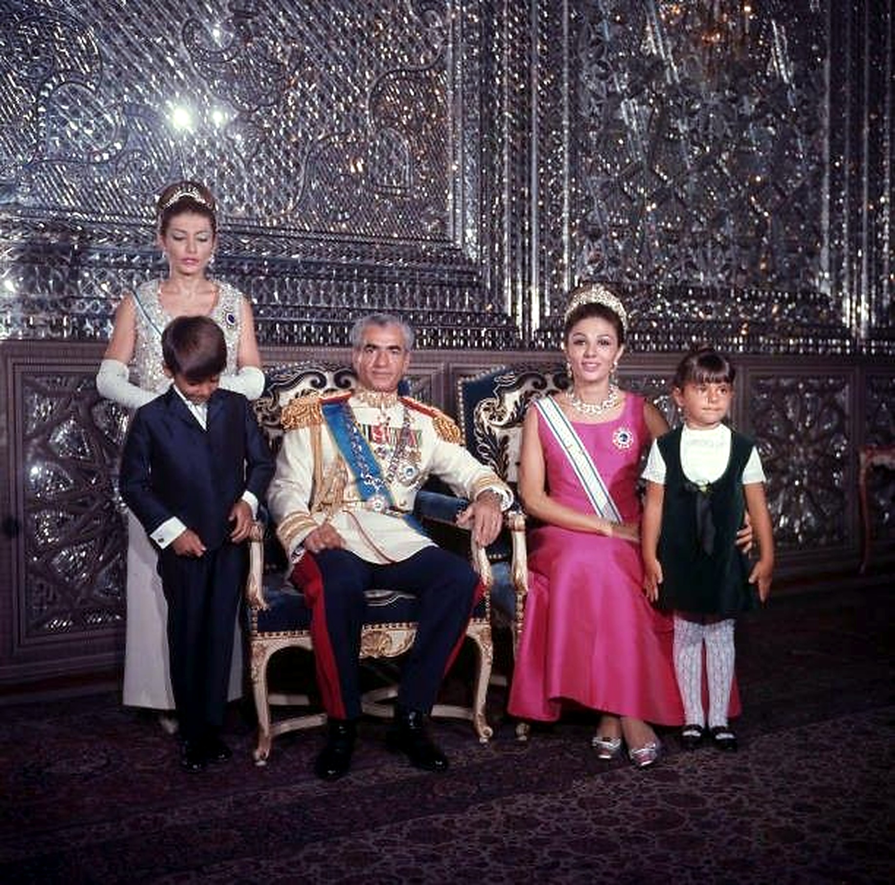 Full imperial family in the mirrored hall.