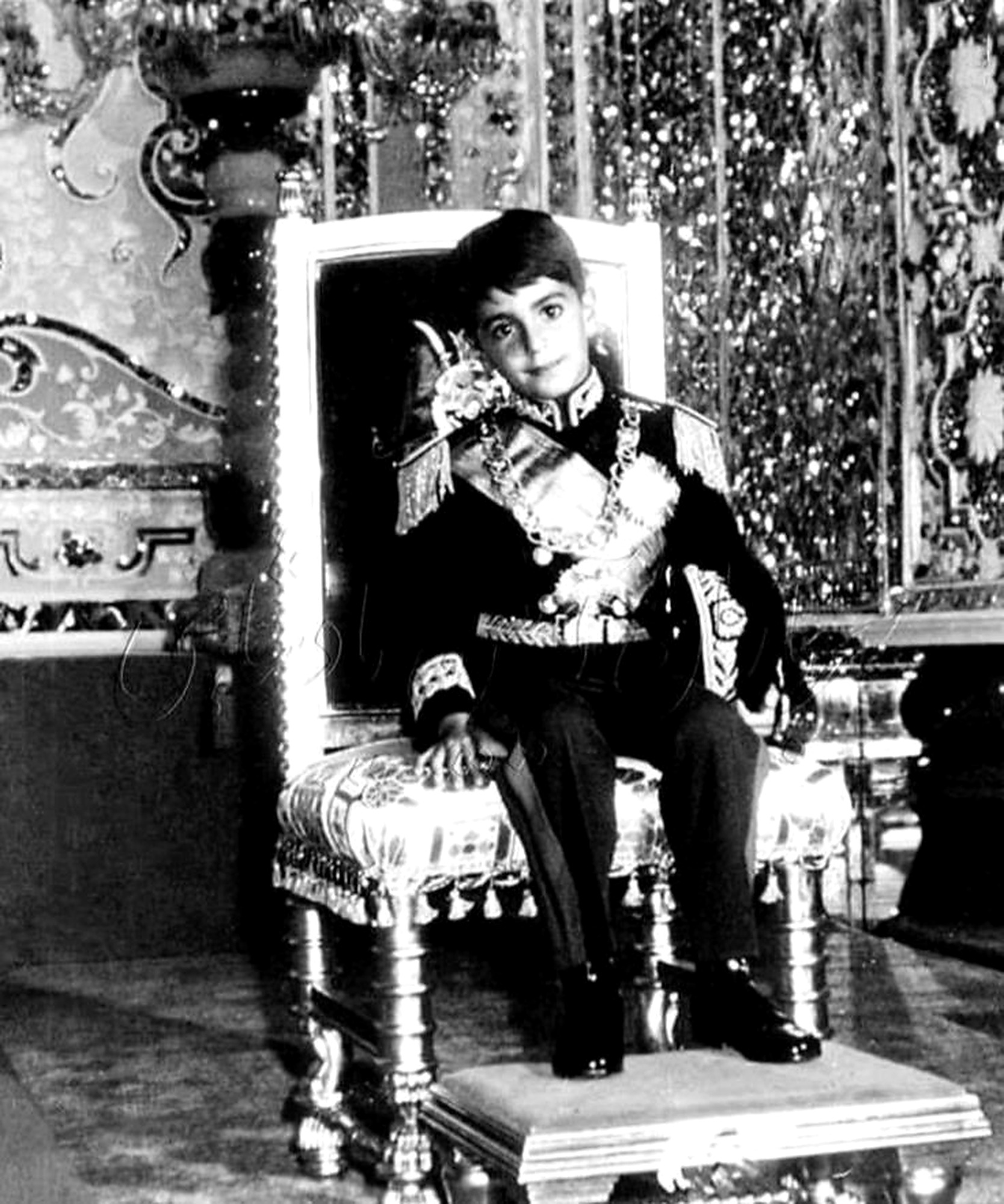 Young Crown Prince Reza on the throne.